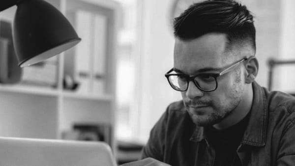 Worker investigates how Safe Work Australia improves work health and safety (WHS) across Australian workplaces.